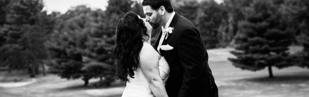 Bride and groom on golf course
